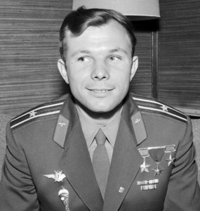 A person in a military uniform [world-famous after his 1961 flight, Cosmonaut Gagarin was then an instantly recognizable face that obviously looked nothing like Marvel’s early 1960s depictions of the Reds; alas, the creators were pandering to the Comics Code Authority in order not to get shut down for good]